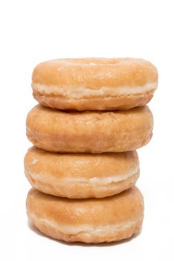 Donuts beyaz arka plan üzerinde yakın çekim.