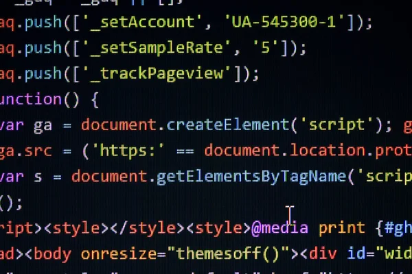 Close up of computer web page code inside of html file.