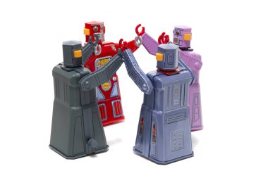 Vintage teneke robot oyuncak bir daire toplantı bağlı.