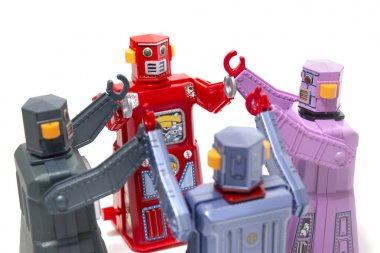 Vintage teneke robot oyuncak bir daire toplantı bağlı.