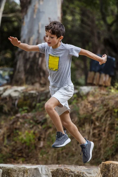 Cute boy outdoor running — Stock Photo, Image