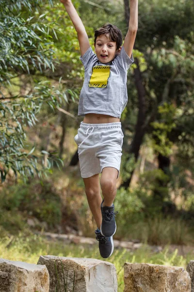 Cute boy outdoor running — Stock Photo, Image