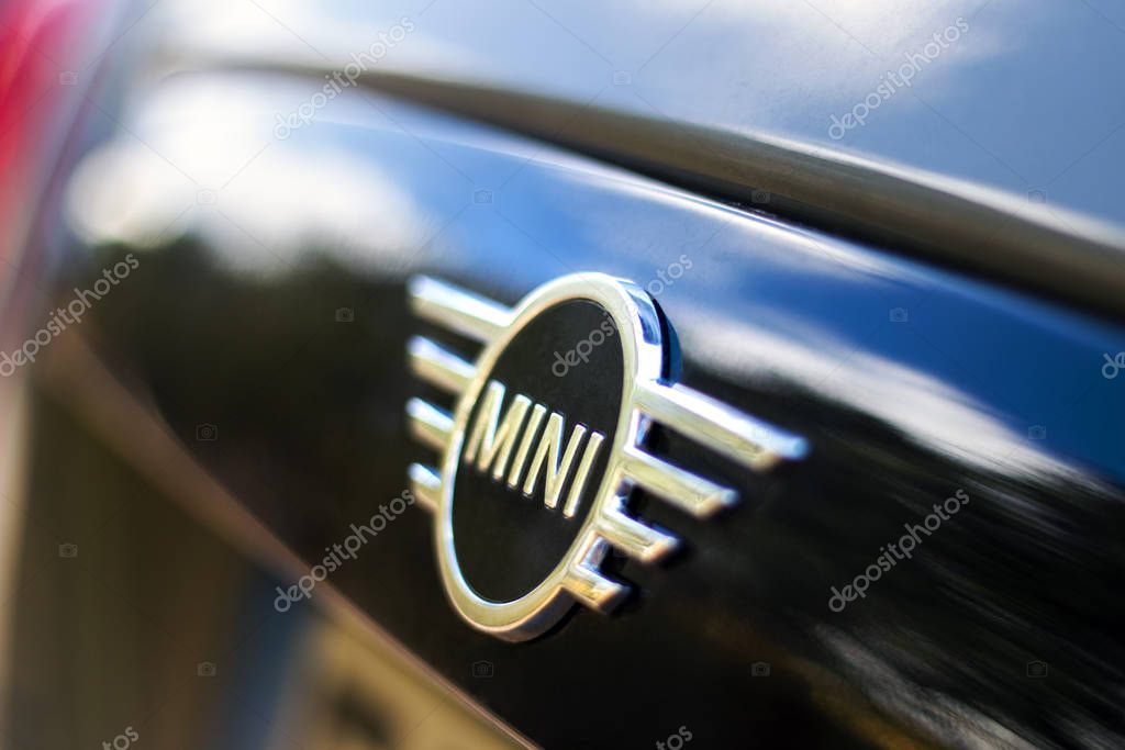 SAO BRAS DE ALPORTEL, PORTUGAL: 6th NOVEMBER 2019 - Close up view of the mini cooper brand logo on the hood of car.