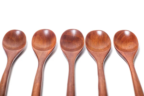 Cucchiai di legno su sfondo bianco — Foto Stock