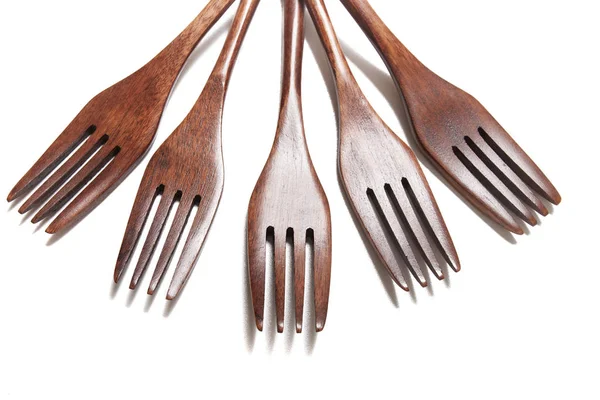Wooden forks over white background — Stock Photo, Image