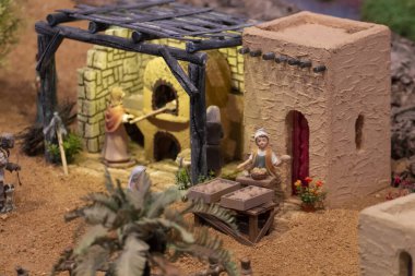 VILA REAL SANTO ANTONIO, PORTUGAL - 28th DECEMBER 2019: Christmas Nativity scene exhibition of many figurines depicting daily life across different business and religious activities.