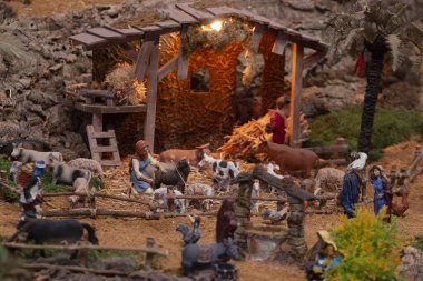 VILA REAL SANTO ANTONIO, PORTUGAL - 28th DECEMBER 2019: Christmas Nativity scene exhibition of many figurines depicting daily life across different business and religious activities.