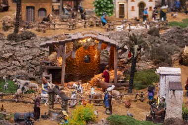 VILA REAL SANTO ANTONIO, PORTUGAL - 28th DECEMBER 2019: Christmas Nativity scene exhibition of many figurines depicting daily life across different business and religious activities.