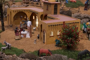 VILA REAL SANTO ANTONIO, PORTUGAL - 28th DECEMBER 2019: Christmas Nativity scene exhibition of many figurines depicting daily life across different business and religious activities.