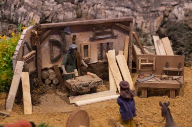 VILA REAL SANTO ANTONIO, PORTUGAL - 28th DECEMBER 2019: Christmas Nativity scene exhibition of many figurines depicting daily life across different business and religious activities.