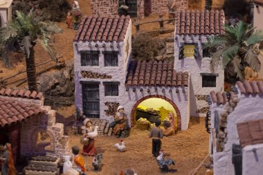 VILA REAL SANTO ANTONIO, PORTUGAL - 28th DECEMBER 2019: Christmas Nativity scene exhibition of many figurines depicting daily life across different business and religious activities.