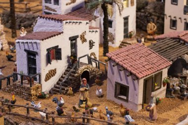 VILA REAL SANTO ANTONIO, PORTUGAL - 28th DECEMBER 2019: Christmas Nativity scene exhibition of many figurines depicting daily life across different business and religious activities.