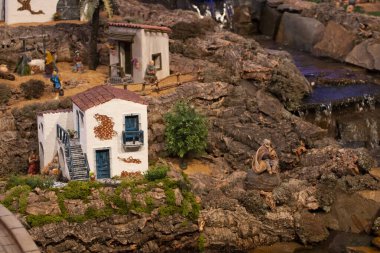 VILA REAL SANTO ANTONIO, PORTUGAL - 28th DECEMBER 2019: Christmas Nativity scene exhibition of many figurines depicting daily life across different business and religious activities.