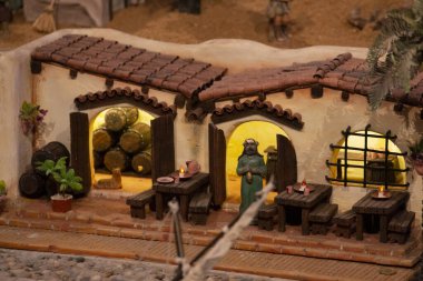 VILA REAL SANTO ANTONIO, PORTUGAL - 28th DECEMBER 2019: Christmas Nativity scene exhibition of many figurines depicting daily life across different business and religious activities.