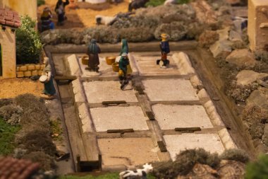 VILA REAL SANTO ANTONIO, PORTUGAL - 28th DECEMBER 2019: Christmas Nativity scene exhibition of many figurines depicting daily life across different business and religious activities.