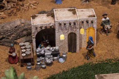 VILA REAL SANTO ANTONIO, PORTUGAL - 28th DECEMBER 2019: Christmas Nativity scene exhibition of many figurines depicting daily life across different business and religious activities.