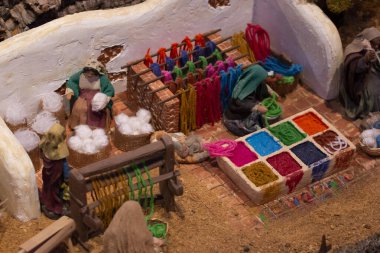 VILA REAL SANTO ANTONIO, PORTUGAL - 28th DECEMBER 2019: Christmas Nativity scene exhibition of many figurines depicting daily life across different business and religious activities.