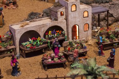 VILA REAL SANTO ANTONIO, PORTUGAL - 28th DECEMBER 2019: Christmas Nativity scene exhibition of many figurines depicting daily life across different business and religious activities.