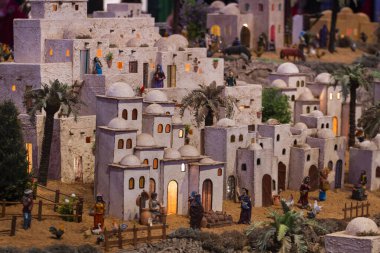 VILA REAL SANTO ANTONIO, PORTUGAL - 28th DECEMBER 2019: Christmas Nativity scene exhibition of many figurines depicting daily life across different business and religious activities.