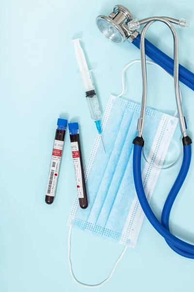 Fictional Blood Samples Infected Coronavirus Stethoscope Mask Syringe Light Blue — 图库照片
