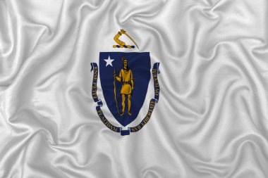 Massachusetts eyalet bayrağı dalgalı ipek kumaş dokusu arka planında.