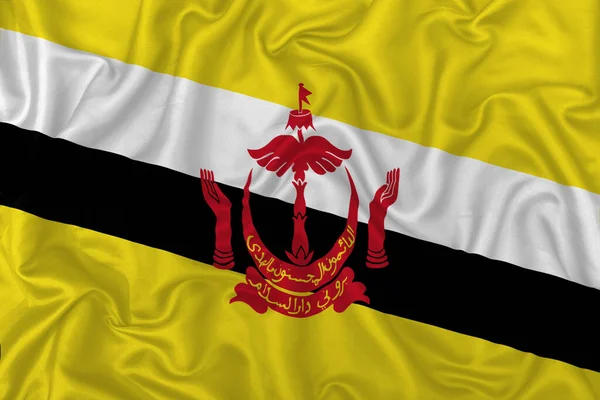 Dalgalı Ipek Kumaş Arka Planında Brunei Ülke Bayrağı — Stok fotoğraf
