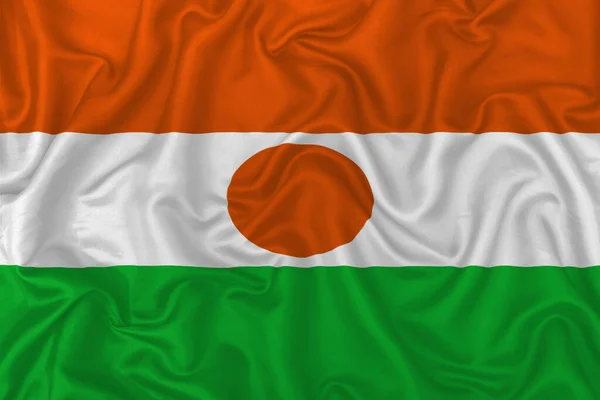 Niger Ország Zászló Hullámos Selyem Textil Szövet Háttér — Stock Fotó