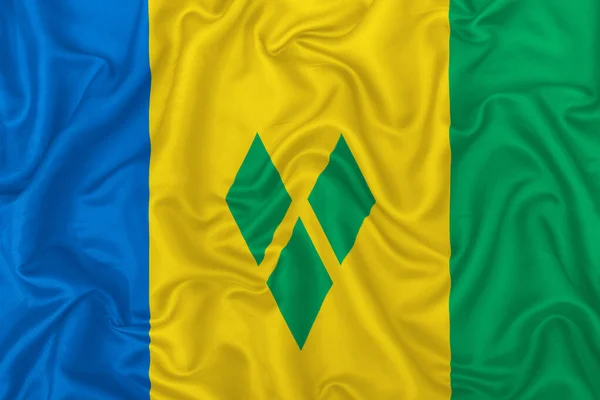 Saint Vincent Grenadines Flag Wavy Silk Textile Fabric Background — Stock Photo, Image