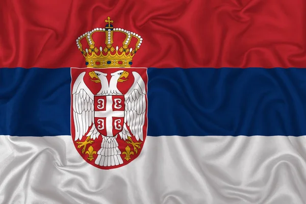 波纹丝织物背景上的塞尔维亚国旗 — 图库照片