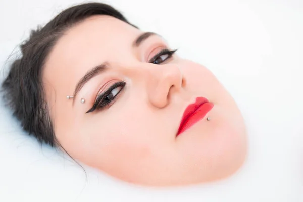 Woman Face Closeup Half Submerged Milky Bathtub — Stock Photo, Image