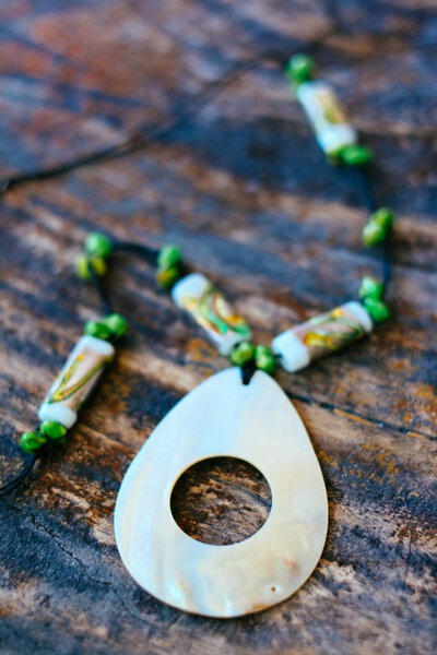 Hand made beautiful necklaces made from abalone shell and coral beads