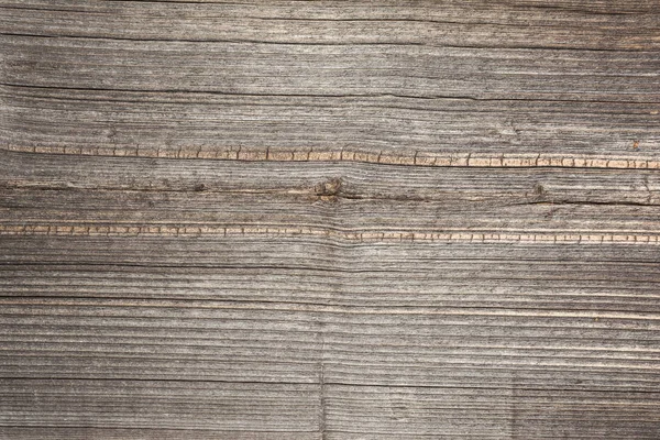 Lättnad texturen av den gamla träskiva med fattiga bearbetning, uttrycksfulla riktningen av träfibrerna yta — Stockfoto