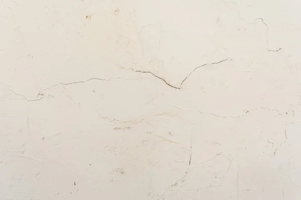 Textura blanca de la antigua pared pintada en relieve — Foto de Stock
