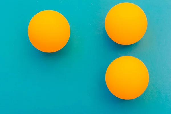 Yellow tennis ball on a blue background — Stock Photo, Image