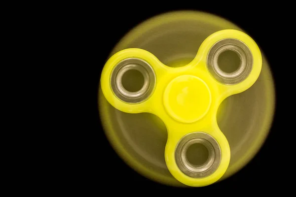 yellow fidget finger spinner stress relieving toy