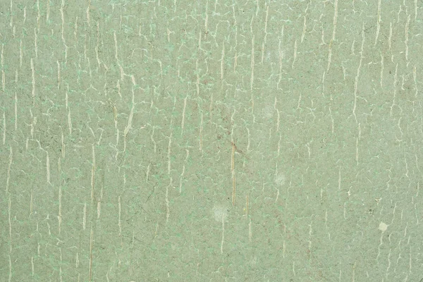 Cracked green paint on a wooden base — Stock Photo, Image