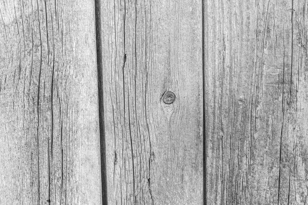 Ciemny tekstura stary naturalnego drewna z pęknięć z ekspozycji na słońce i wiatr — Zdjęcie stockowe