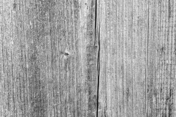 Struttura scura del vecchio legno naturale con crepe dovute all'esposizione al sole e al vento — Foto Stock