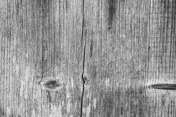 Texture sombre du vieux bois naturel avec des fissures dues à l'exposition au soleil et au vent — Photo