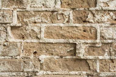 Antik bir binada bir eski yıkık tuğla duvar dokusu