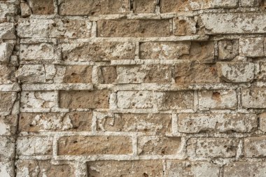 Antik bir binada bir eski yıkık tuğla duvar dokusu