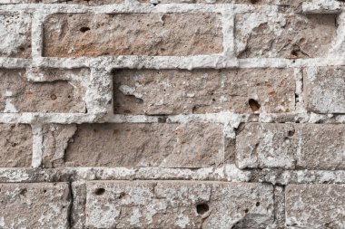Antik bir binada bir eski yıkık tuğla duvar dokusu
