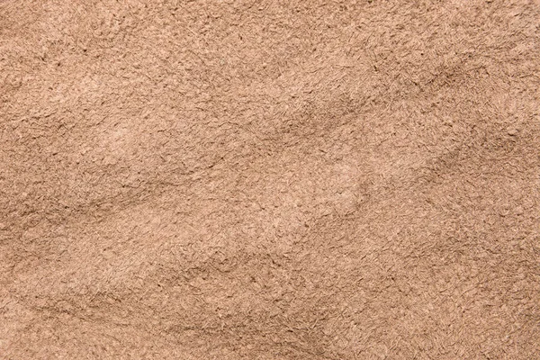 Textura camurça marrom escuro couro macio, tecido de veludo, parte inferior da superfície de couro — Fotografia de Stock