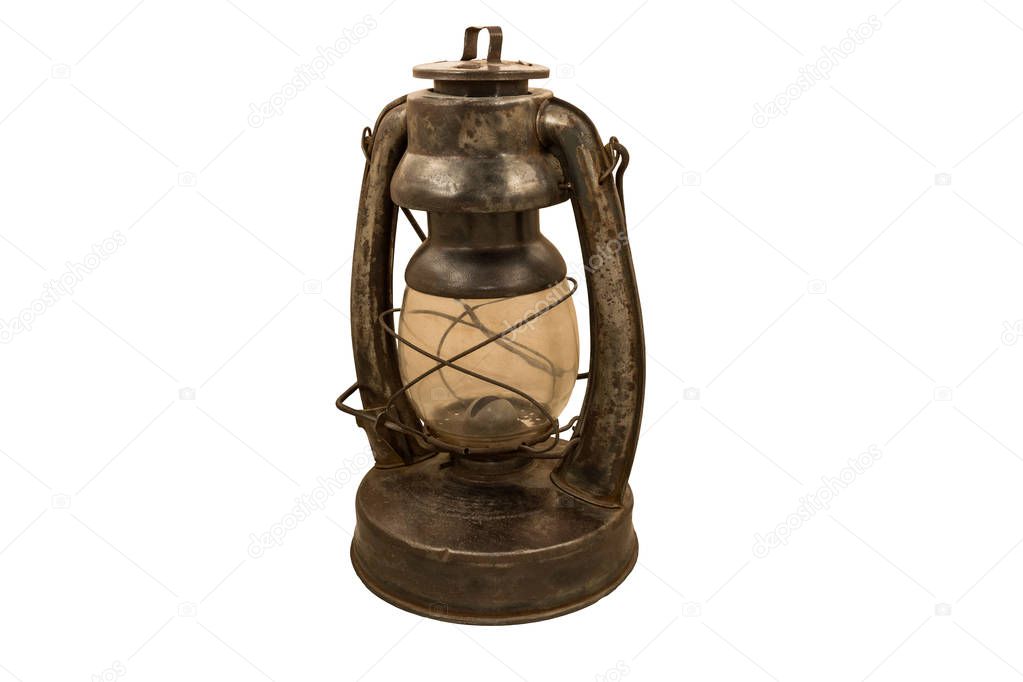 old rusty kerosene lamp on a white background