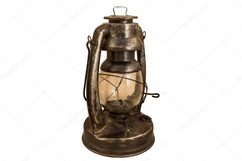 old rusty kerosene lamp on a white background