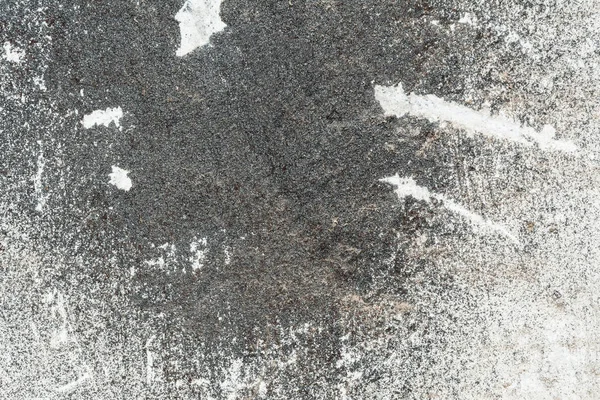 Textura da parede de concreto riscado velho, mancha escura na parede — Fotografia de Stock