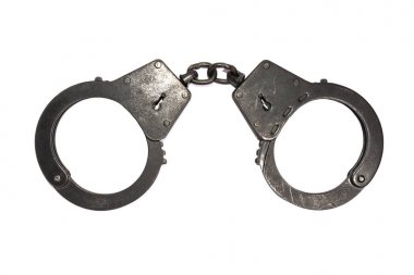 Beyaz arka plan üzerinde küçük çizikler ile siyah metal kelepçe