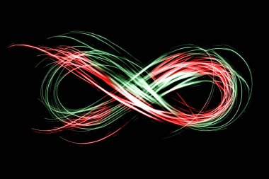siyah bir arka plan üzerinde ışık Neon tarafından oluşturulan sonsuzluk işareti dondur