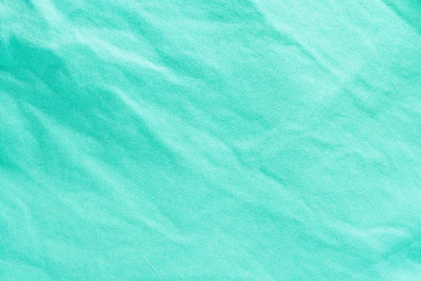 Textura de uma superfície de fibra de algodão verde formando um tecido, fundo abstrato — Fotografia de Stock