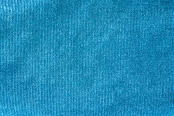 Doku oluşturan bir kumaş, arka plan mavi pamuk lif yüzeyinin — Stok fotoğraf